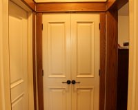 Pre-hung interior door with stain-grade craftsman style oak trim