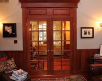 10 lite double door in maple with cherry finish with custom raised panel transom