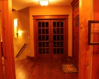 French double doors with red oak casing and header