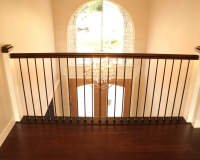Custom maple newel posts and iron balusters