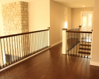 Custom maple newel posts and iron balusters